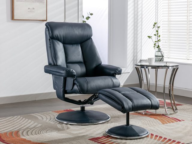 The Basque swivel recliner and footstool in Navy faux leather